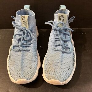 Baby blue slip on sneakers 
men's size 9 or a US women's size 10.5-11